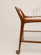 1950s Italian glass and wood bar cart - side profile showing both glass shelves
