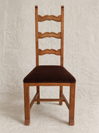 Skønvirke-style carved oak dining chairs with Rose Uniacke brown cotton velvet seats in Logwood