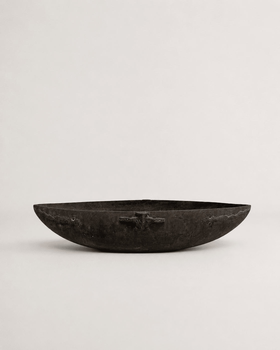 Early 20th century wooden feasting bowl with aged patina