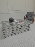 Italian chrome and glass stacked coffee table - overhead three-quarter view of the glass top