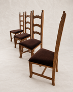 Skønvirke-style carved oak dining chairs with Rose Uniacke brown cotton velvet seats in Logwood