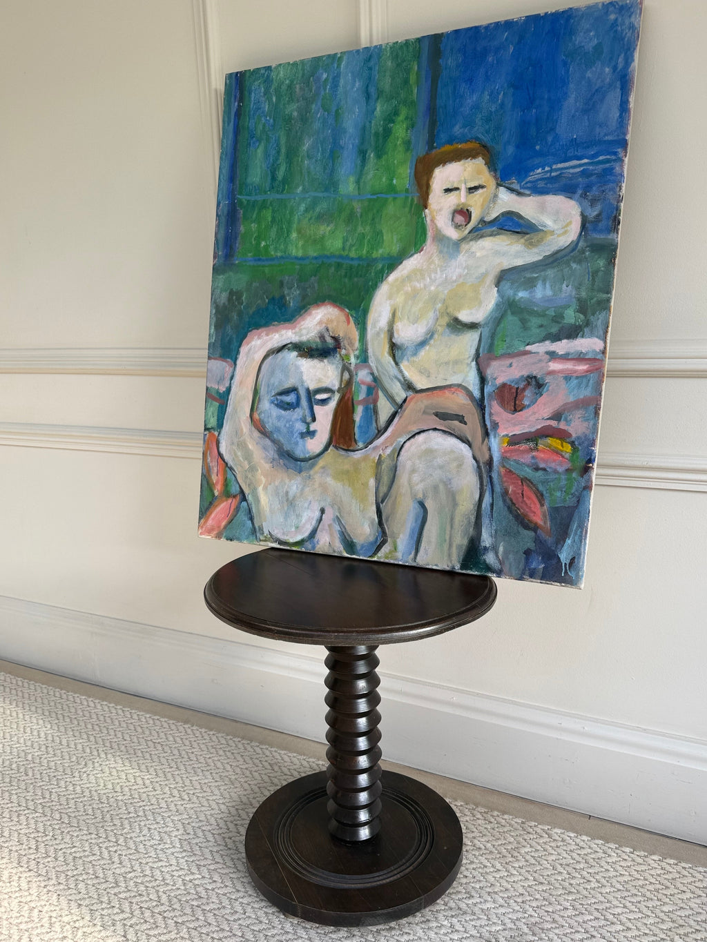 An expressive oil painting of two female nudes