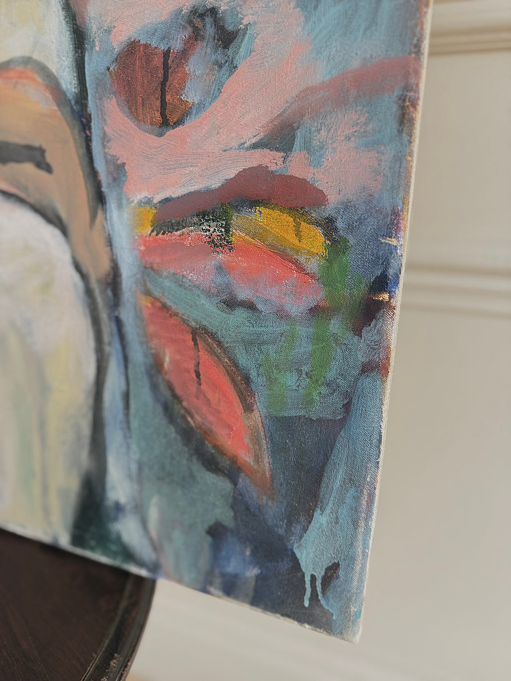 An expressive oil painting of two female nudes