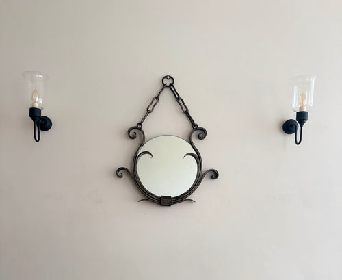 1940s wrought iron wall mirror - installed between two wall sconces