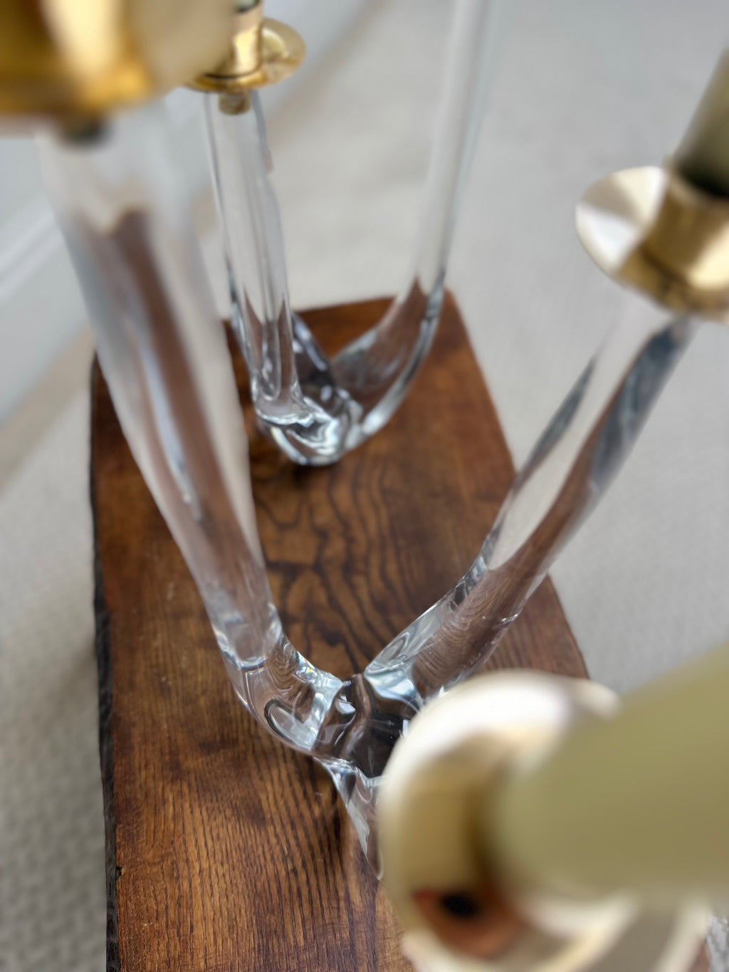 Pair of mid-century sculptural clear glass three-arm candelabras
