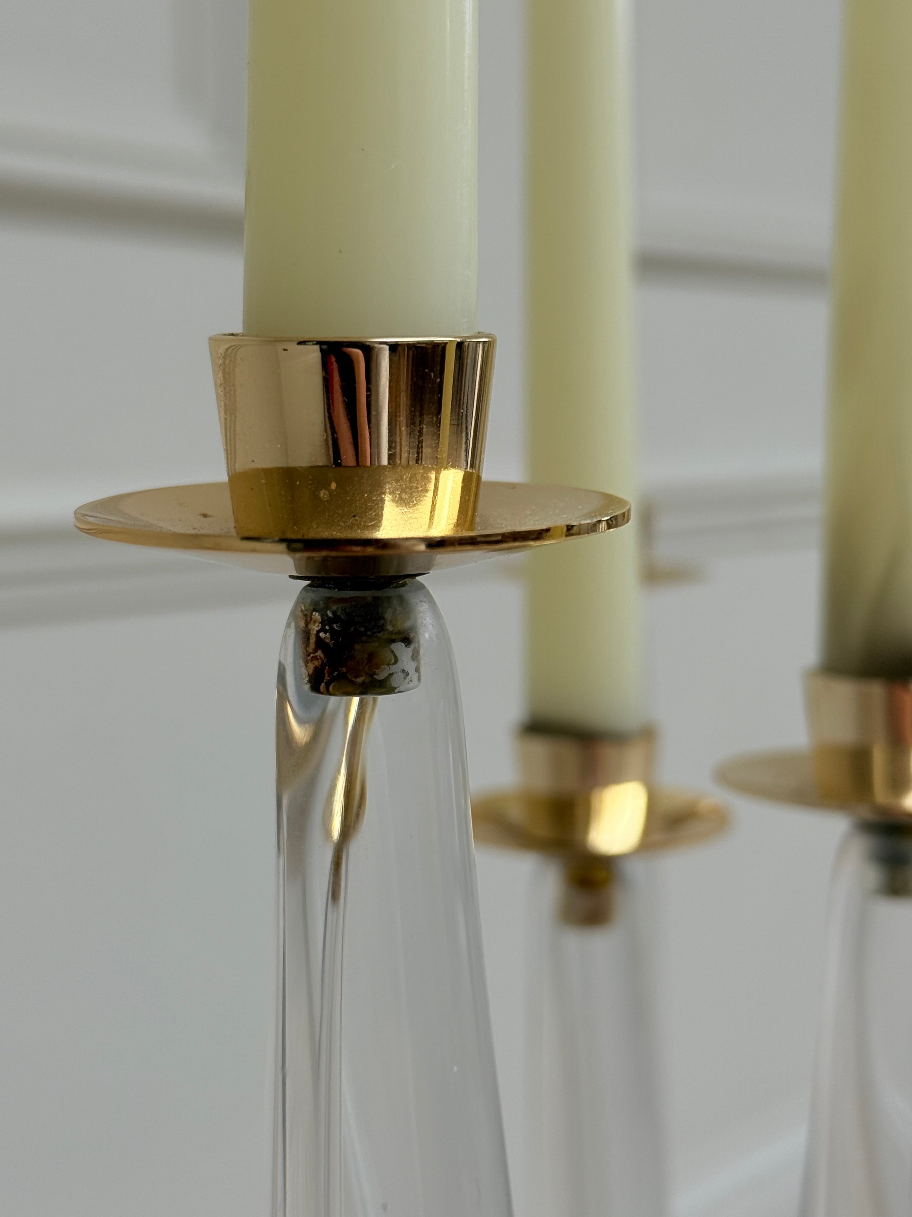 Pair of mid-century sculptural clear glass three-arm candelabras