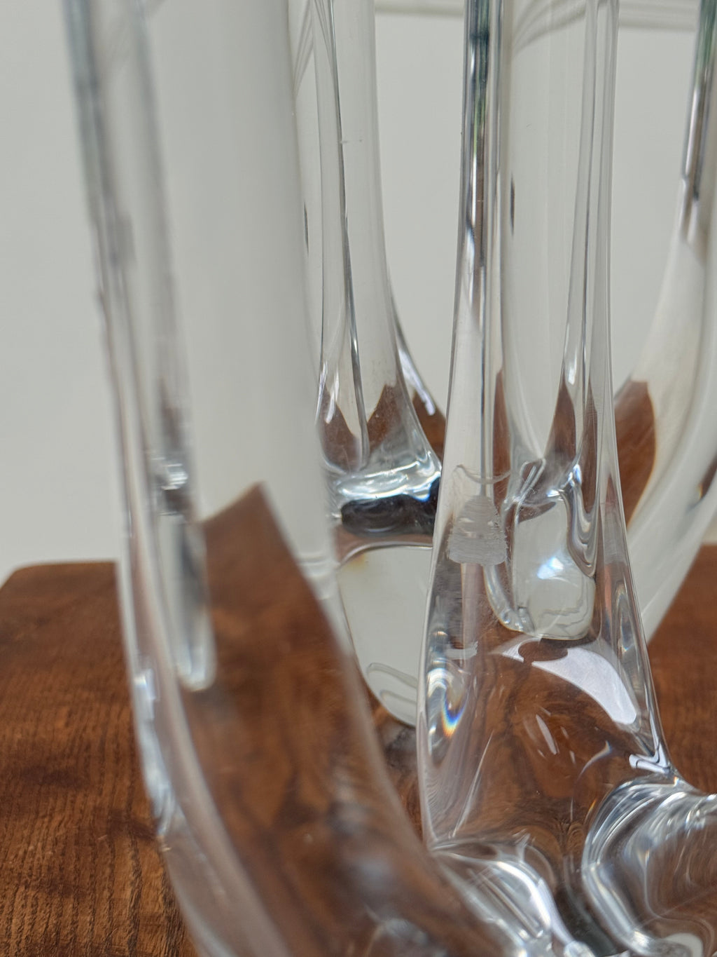Pair of mid-century sculptural clear glass three-arm candelabras
