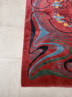 hand-knotted Nepalese Tibetan abstract rug - bound corner and pile shown at an angle