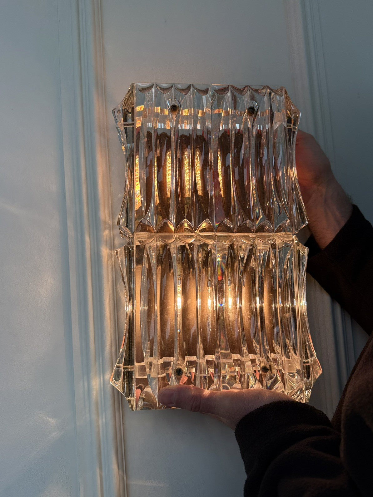 Pair Of Large Mid Century Faceted Glass Wall Sconces With Aged Brass Backplates