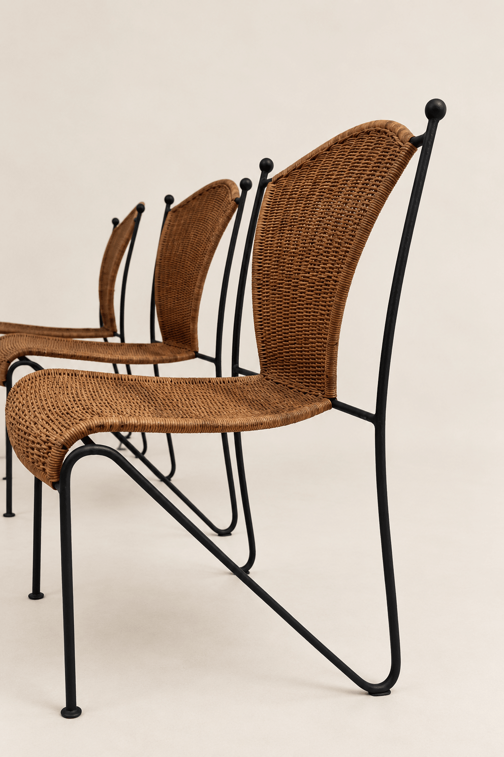 mid-century wicker and iron dining chairs - single chair in side profile