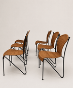 mid-century wicker and iron dining chairs - side view of the grouped chairs