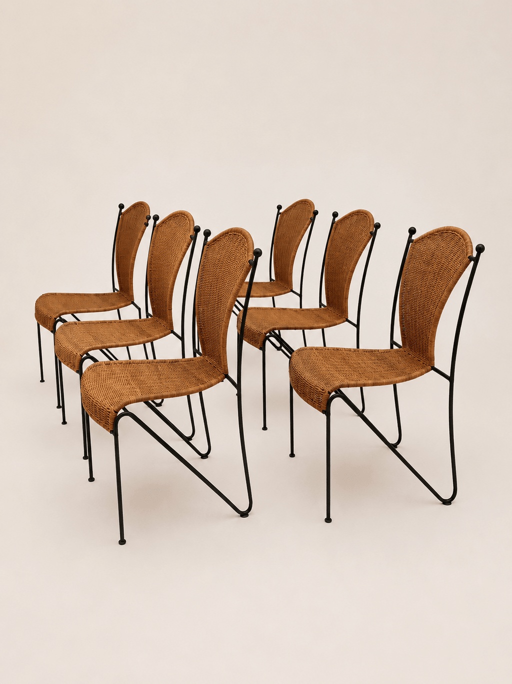 mid-century wicker and iron dining chairs - set arranged in two rows, front view