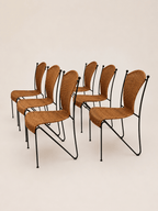 mid-century wicker and iron dining chairs - set arranged in two rows, front view