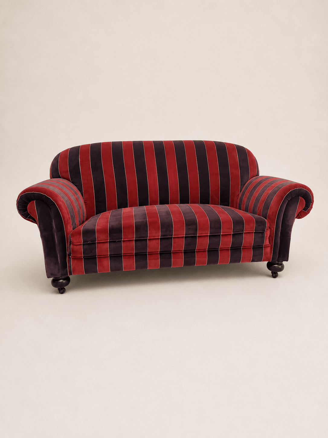 striped velvet curved-back two-seater sofa - full sofa shown straight on